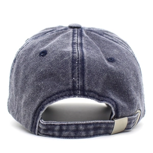 Detail view of washed denim baseball cap featuring an adjustable metal buckle at the back