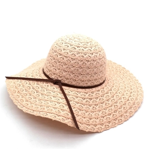 Extra wide brim pink sun hat for women with elegant leather strap and woven texture