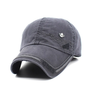 Vintage dark gray cotton baseball cap with embroidered letters and maple leaf metal badge