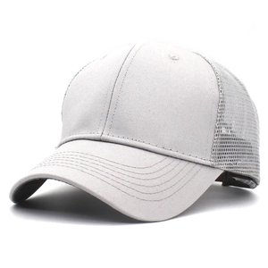 Detail of light gray mesh trucker hat showing reinforced stitching and breathable netting
