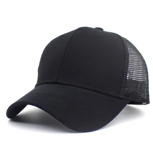Detail view of black mesh trucker hat with breathable fabric and curved sun visor brim
