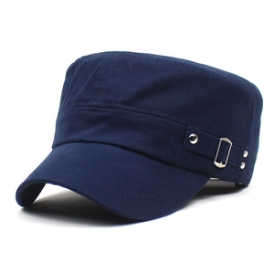 Close-up of navy blue cotton military cap featuring metal button and rivet side details
