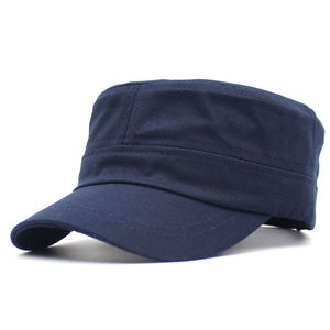 Detail view of navy blue cotton military cap showing durable twill texture and reinforced stitching
