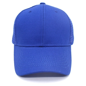 Detailed front view of navy blue mesh trucker hat showing cotton twill and breathable net