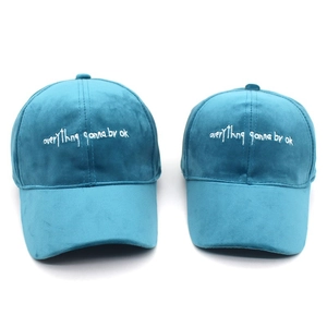 Velvet baseball cap set in lake blue featuring white embroidered motivational text