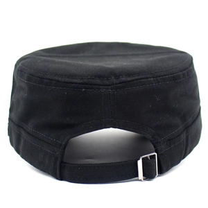 Detail of adjustable metal buckle and fabric strap on the back of a black military cap