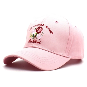 Pink cotton baseball cap with rose flower embroidery and curved brim for women