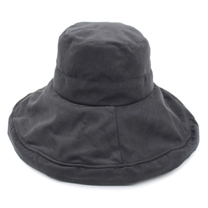 Close-up of black wide brim sun hat showing the durable cotton fabric texture and stitching