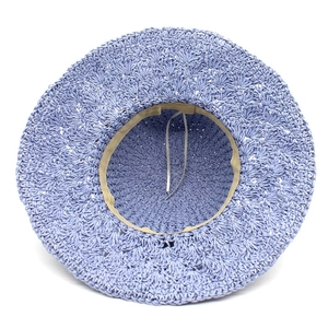 Handmade raffia sun hat in lavender purple with breathable crochet patterns for women