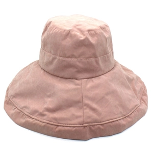 Detailed texture of dusty pink wide brim sun hat with soft fabric finish and wavy edge
