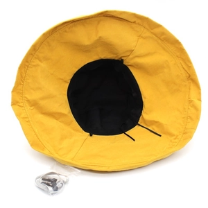 Bright yellow wide brim sun hat for women with adjustable chin strap and black lining