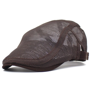 Detail view of the breathable mesh texture and metal adjustable buckle on the brown ivy cap