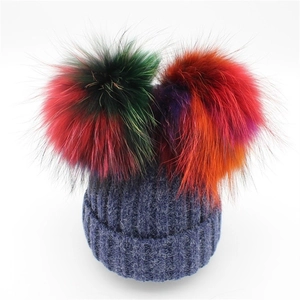 Women's dark blue wool knit beanie with dual large colorful gradient fur pom-poms
