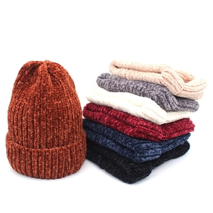 Thick ribbed chenille knit beanies shown in a variety of vibrant seasonal colors