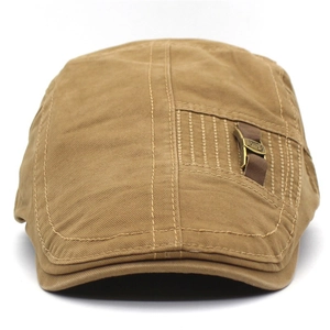 Vintage khaki cotton duckbill beret hat with side leather strap and metal buckle detail
