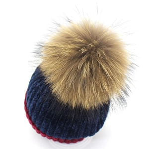 Women's winter knit beanie with chenille lining and large genuine raccoon fur pom pom