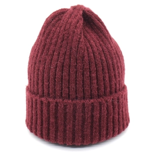 Classic deep red ribbed knit beanie hat with turn-up cuff for autumn and winter warmth