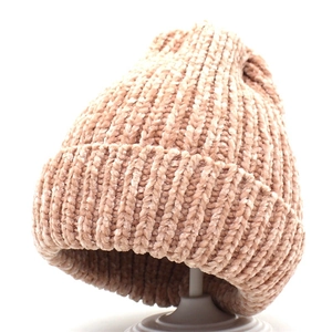 Detail of light beige chenille knit beanie showing soft velvet texture and folded cuff