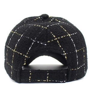 Women's black tweed baseball cap with gold metallic lattice and pom-pom detail