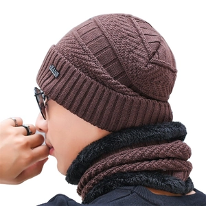 Detail of dark brown knit beanie and neck warmer with thick fleece lining and Jeans label