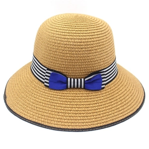 Women's summer straw hat with wide brim, yellow weave and striped blue bow decoration
