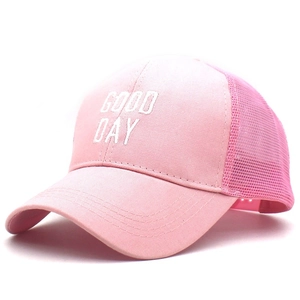 Detail of pink mesh baseball cap featuring white Good Day embroidery and breathable fabric