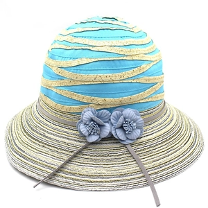 Women's summer sun hat featuring turquoise striped patterns and floral accents
