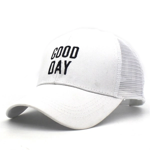 Detail of white mesh trucker hat featuring Good Day embroidery and curved brim