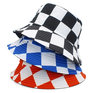 Detail view of cotton sun hats in black, blue, and red checkered and plaid patterns