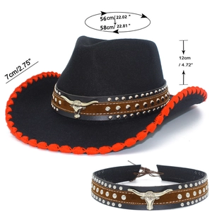 Detail of western cowboy hat with orange stitching and bull head metal ornament
