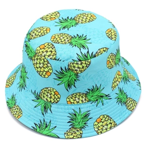 Light blue bucket hat with yellow pineapple print, reversible cotton sun cap for women