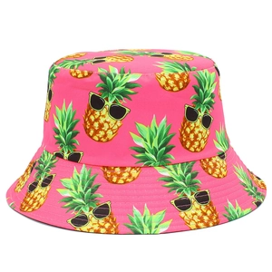 Pink bucket hat with cute pineapple print and sunglasses pattern for summer beach wear