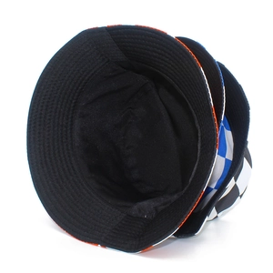 Detail view of double-sided bucket hats with checkered patterns and reinforced stitching