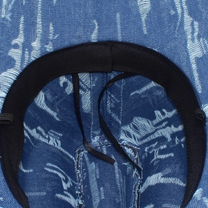 Macro shot of inner sweatband and adjustable drawstring on vintage distressed jazz hat