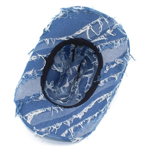 Top view of blue denim cowboy hat showing distressed frayed edges and texture