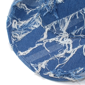Classic blue denim jazz hat with distressed vintage street style and frayed edges