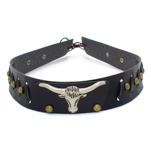 Close-up of black leather jazz hat band with silver bull head and vintage studs