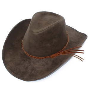 Detail of western cowboy hat in dark brown suede with woven leather band and tassels