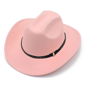 Close-up of pink felt cowboy hat with black studded band and golden buckle detail