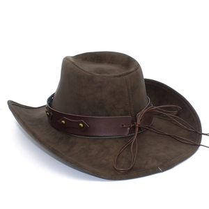 Macro shot of dark brown faux leather cowboy hat with studded band and suede texture