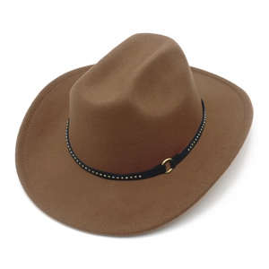 Close-up of brown wool felt western hat with black rivet band and gold buckle detail