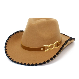 Close-up of brown felt cowboy hat featuring gold chain detail and black scalloped edge
