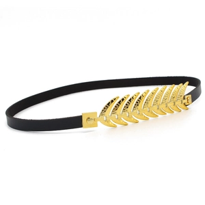 Detail of a thin black leather hat band featuring a polished gold feather-shaped ornament