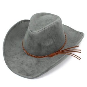 Detail of grey suede fedora hat with brown braided trim and fringe accents on side