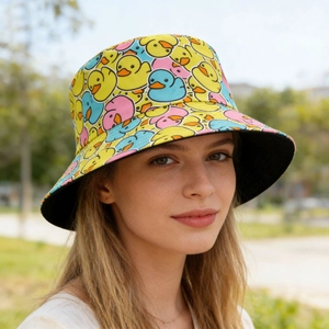 Close-up of colorful little duck print on a reversible sun bucket hat for outdoor activities