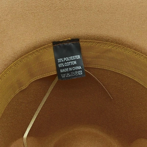 Detail view of the felt hat interior featuring cotton-polyester blend label and sweatband