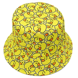 Detail of double-sided bucket hat featuring vibrant yellow cartoon rubber duck pattern