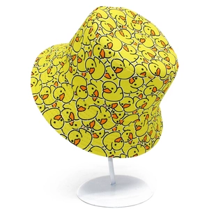 Close-up of vibrant little yellow duck print on a casual cotton bucket hat for sun protection