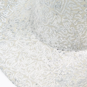 Sparkling silver sequin western cowboy hat with intricate swirl patterns and pearl accents
