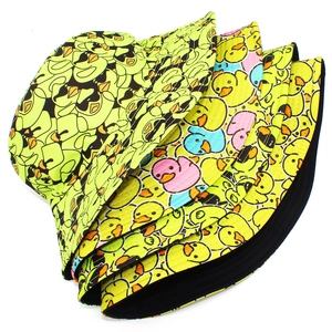 Detailed stack of reversible cartoon duck bucket hats in yellow, pink, and blue colors